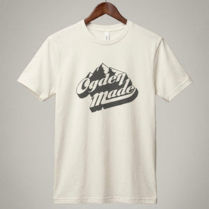 Hanging white tee with black retro Ogden Made logo in center